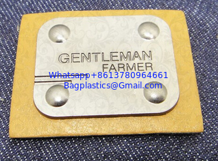 China Manufacturer custom metal jeans pu label and printing leather patch label clothing label tag for jeans supplier