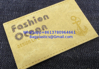 China Hot Sell Custom enamel PU Leather Jeans leather patch Metal Label With Press Logo On Leather supplier