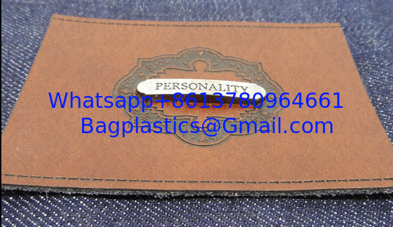 Hot Sell Custom enamel PU Leather Jeans leather patch Metal Label With Press Logo On Leather supplier